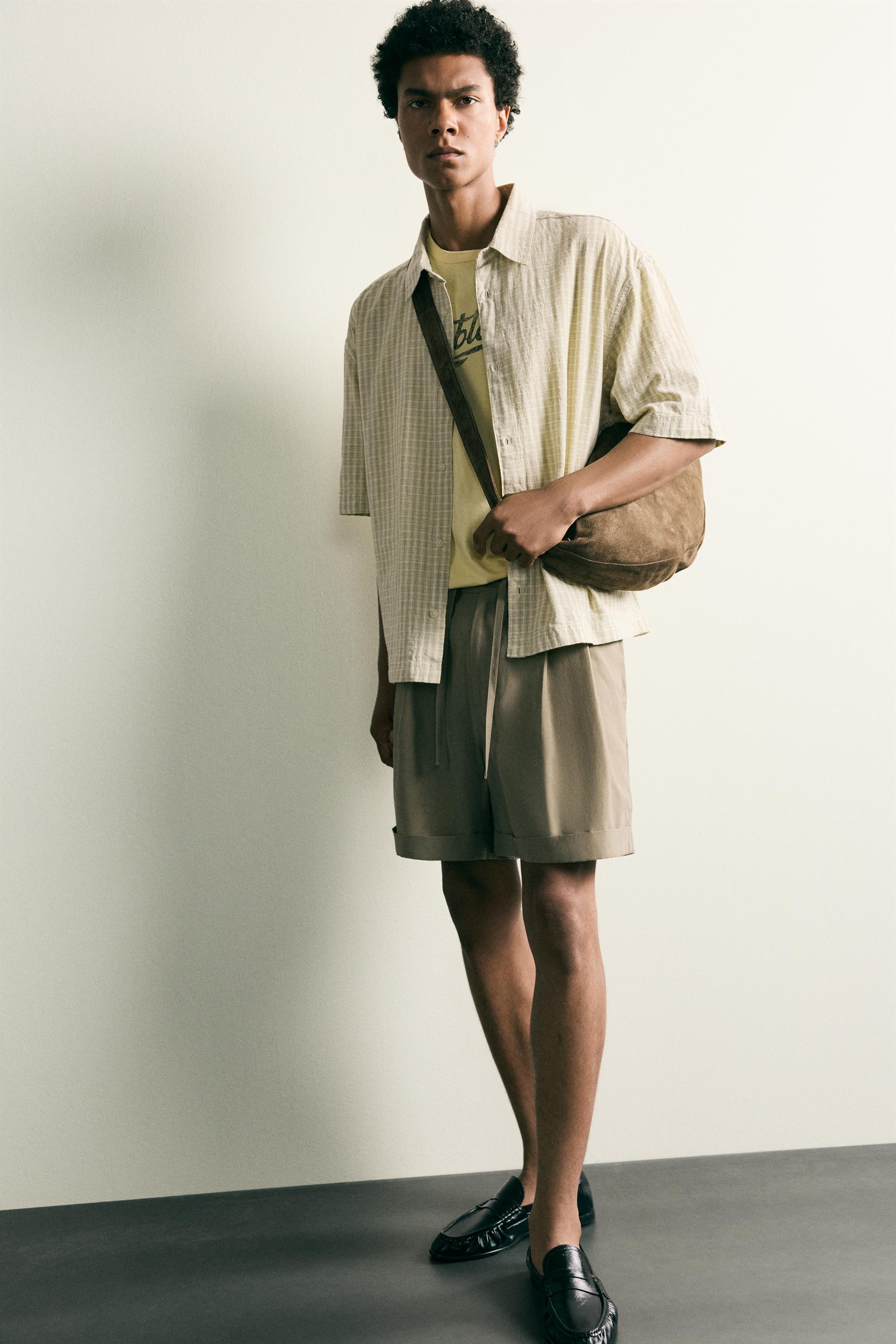 FLUID RELAXED FIT PLEATED SHORTS